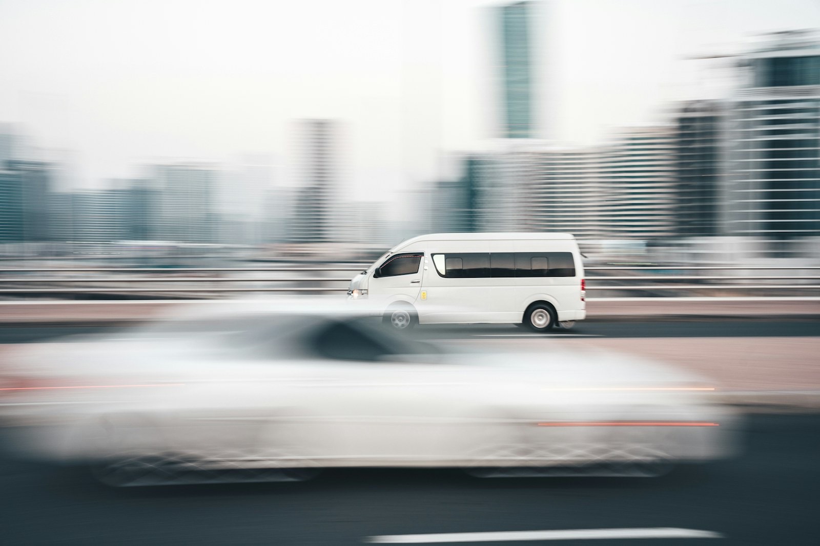 A delivery van moving through a city street